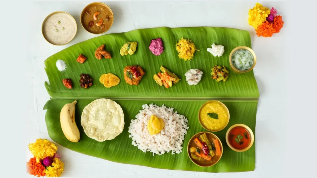 Thiruvonam,
Onam 2024,
Happy Onam,
Happy Onam 2024,
Pookalam design made with flowers for Onam 2024 celebration,
Onam Sadhya feast on a banana leaf during Thiruvonam in 2024,